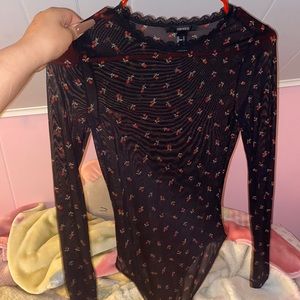 Sheer see threw black rose body suit